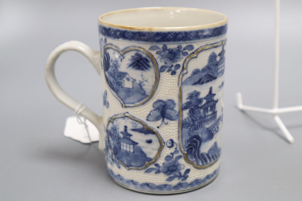 Five pieces of Chinese ceramics including two blue and white plates, a Canton plate, a blue and white mug and a prunus jar and cover,